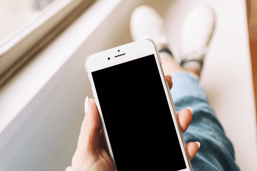 Woman Holding White Iphone Mockup