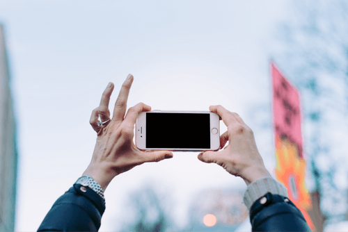 Woman Holding Landscape Iphone Mockup