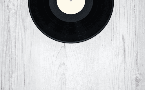 Vinyl Record Mockup On Wooden Floor