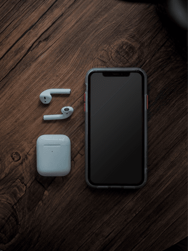 Iphone Mockup On Wooden Table Top View