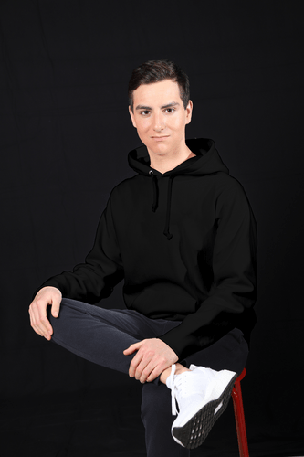 Man Sitting In Black Hoodie Mockup